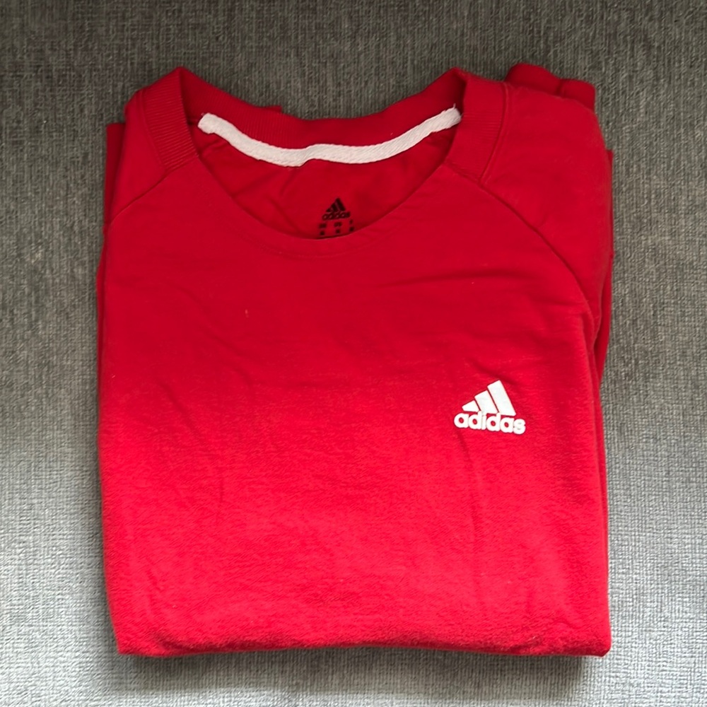 No holes or stains, lightly worn Adidas size medium crew neck.
